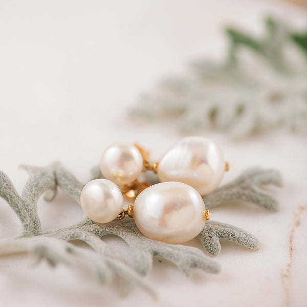 White FWP, 9K YG stud earrings