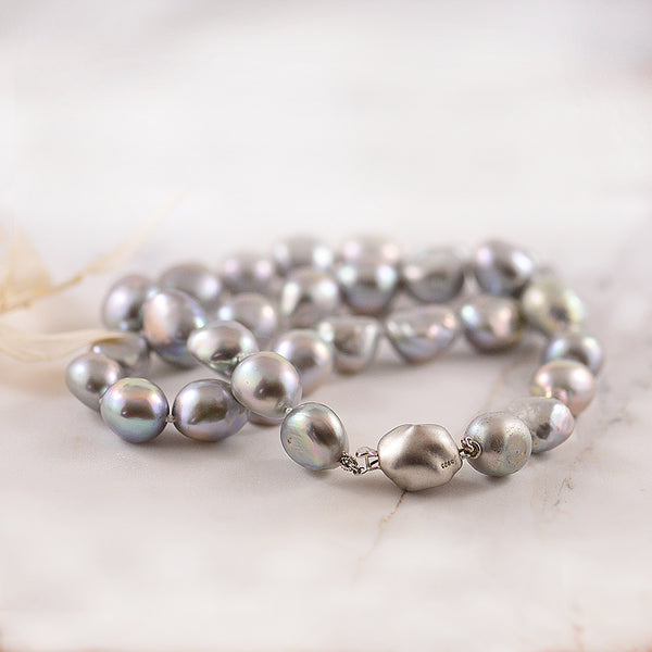 Freshwater Pearl, Grey Semi Baroque Strand with silver pebble clasp