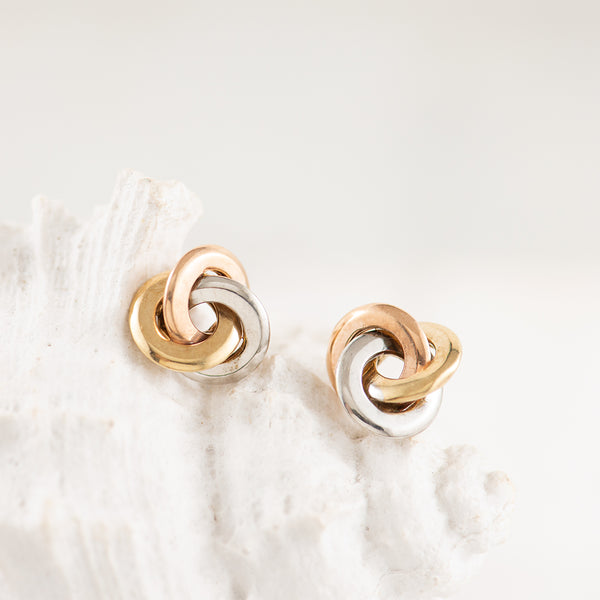 Rose, yellow and white gold open knot stud earrings