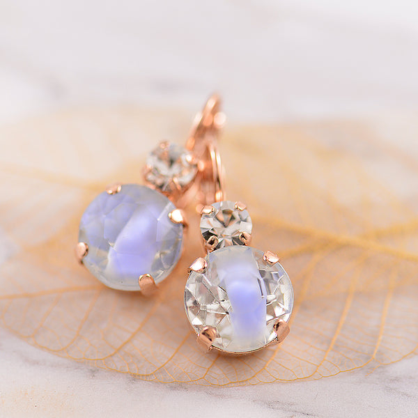 Large round Blue Austrian crystal earrings set with rose gold plating